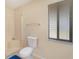 Clean bathroom with shower and toilet at 7061 Denmark St, Englewood, FL 34224