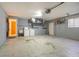 Garage with washer, dryer, and extra storage at 7061 Denmark St, Englewood, FL 34224