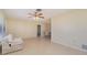 Living room with tile floors and access to the dining area at 7061 Denmark St, Englewood, FL 34224