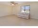 Living room with tile floors, and a sofa at 7061 Denmark St, Englewood, FL 34224