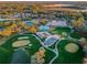 Aerial view of community with clubhouse, pool, and golf course at 7065 Sparkling Creek Ct, Spring Hill, FL 34606