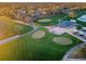 Aerial view of a putting green and golf course at 7065 Sparkling Creek Ct, Spring Hill, FL 34606