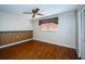 Bright bedroom with wood flooring and ceiling fan at 7065 Sparkling Creek Ct, Spring Hill, FL 34606
