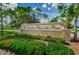 Brick sign marking the entrance to The Country Club of the Pines at 7065 Sparkling Creek Ct, Spring Hill, FL 34606