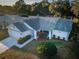 Charming single-story home featuring a two-car garage, and neatly landscaped front yard at 7065 Sparkling Creek Ct, Spring Hill, FL 34606