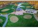 Picturesque aerial view of the golf course with its manicured greens and winding cart paths at 7065 Sparkling Creek Ct, Spring Hill, FL 34606