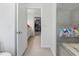 Bathroom with access to walk-in closet and shower at 764 Captiva Ne Ct, St Petersburg, FL 33702