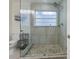 Clean bathroom with a walk-in shower and updated fixtures at 764 Captiva Ne Ct, St Petersburg, FL 33702