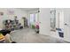 bedroom with built-in shelving and access to bathroom at 764 Captiva Ne Ct, St Petersburg, FL 33702