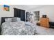 Bedroom with a double bed and wood dresser at 764 Captiva Ne Ct, St Petersburg, FL 33702