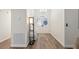 Bright and airy entryway with double doors and wood-look flooring at 764 Captiva Ne Ct, St Petersburg, FL 33702