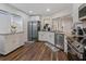 Modern kitchen featuring stainless steel appliances and white cabinets at 764 Captiva Ne Ct, St Petersburg, FL 33702