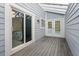 Screened porch with sliding glass doors to bedroom at 764 Captiva Ne Ct, St Petersburg, FL 33702
