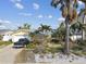 House exterior view with palm trees and needs landscaping at 8114 Causeway S Blvd, St Petersburg, FL 33707