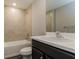 Clean bathroom with a single sink, shower/tub combo and white toilet at 849 Haleybury St, Port Charlotte, FL 33948