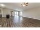 Spacious living area featuring wood-look floors and an open layout at 849 Haleybury St, Port Charlotte, FL 33948