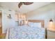 Comfortable bedroom with a king-size bed and walk-in closet at 8565 W Gulf Blvd # 17S, Treasure Island, FL 33706