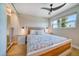 Spacious bedroom with a king-size bed and mirrored closet doors at 8565 W Gulf Blvd # 17S, Treasure Island, FL 33706