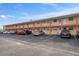 Condominium building with ample parking in front at 8565 W Gulf Blvd # 17S, Treasure Island, FL 33706