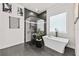 Spa-like bathroom featuring a soaking tub and walk-in shower at 8621 Ivy Stark Blvd, Wesley Chapel, FL 33545