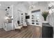 Bright and spacious entryway with modern finishes and a built-in bar at 8621 Ivy Stark Blvd, Wesley Chapel, FL 33545