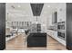 Modern kitchen with island, stainless steel appliances, and white cabinetry at 8621 Ivy Stark Blvd, Wesley Chapel, FL 33545