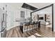 Modern kitchen with island, stainless steel appliances, and white cabinetry at 8621 Ivy Stark Blvd, Wesley Chapel, FL 33545