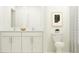 Bathroom with double vanity, toilet and shower at 9404 Runaway Breeze Dr, Land O Lakes, FL 34637