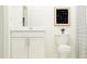Small bathroom with white vanity, toilet and shower at 9404 Runaway Breeze Dr, Land O Lakes, FL 34637