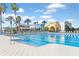 Community lap pool with ample deck space for lounging at 9404 Runaway Breeze Dr, Land O Lakes, FL 34637