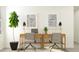 Modern home office featuring two desks and natural light at 9404 Runaway Breeze Dr, Land O Lakes, FL 34637