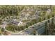 Community farm with various plots, buildings, and parking areas at 9706 Minnow Ray Dr, Land O Lakes, FL 34638