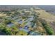 Aerial view highlighting numerous tennis and pickleball courts at 113 Woodlake Wynde # 19, Oldsmar, FL 34677