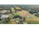 Aerial view of golf course and clubhouse at 113 Woodlake Wynde # 19, Oldsmar, FL 34677