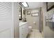 Bathroom with a double vanity, shower, and updated finishes at 113 Woodlake Wynde # 19, Oldsmar, FL 34677