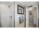 Small bathroom with a shower, linen closet, and a simple design at 113 Woodlake Wynde # 19, Oldsmar, FL 34677