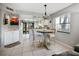 Kitchen and dining area with breakfast bar at 113 Woodlake Wynde # 19, Oldsmar, FL 34677