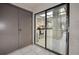 View of the kitchen through a sliding glass door from outside at 113 Woodlake Wynde # 19, Oldsmar, FL 34677