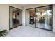 Sliding glass doors open to a private patio area at 113 Woodlake Wynde # 19, Oldsmar, FL 34677