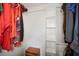 Walk-in closet with hanging rods and shelving for storage at 113 Woodlake Wynde # 19, Oldsmar, FL 34677