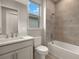 Bathroom with single vanity, tub, and shower at 11482 Boundless Ter, Venice, FL 34293