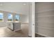 Kitchen features an island and a large walk-in pantry at 11482 Boundless Ter, Venice, FL 34293