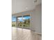 Living room with sliding glass doors leading to a patio and backyard at 11482 Boundless Ter, Venice, FL 34293