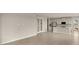 Open concept living area with kitchen, tile floors and access to backyard at 11482 Boundless Ter, Venice, FL 34293