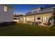 Expansive backyard with a covered patio, outdoor seating and a lush lawn perfect for entertaining at 120 25Th N Ave, St Petersburg, FL 33704
