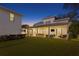 Expansive backyard with a covered patio, outdoor seating and a lush lawn perfect for entertaining at 120 25Th N Ave, St Petersburg, FL 33704