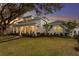 Charming two-story home featuring a welcoming front porch and landscaped front yard at 120 25Th N Ave, St Petersburg, FL 33704