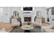 Cozy living room with a fireplace, stylish decor, and hardwood floors at 120 25Th N Ave, St Petersburg, FL 33704