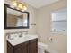 Updated bathroom with vanity and toilet at 1214 E Curtis St, Tampa, FL 33603