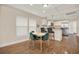 Modern dining area with green chairs and wood floors at 1214 E Curtis St, Tampa, FL 33603